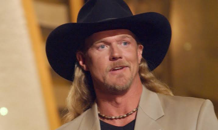 "trace adkins shot by wife"